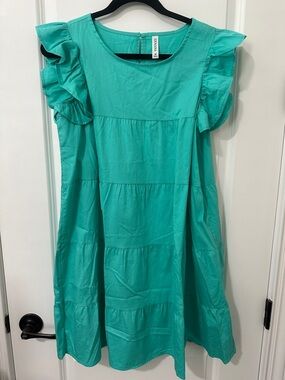 Zenana light teal ruffled sleeve NWOT. Size medium